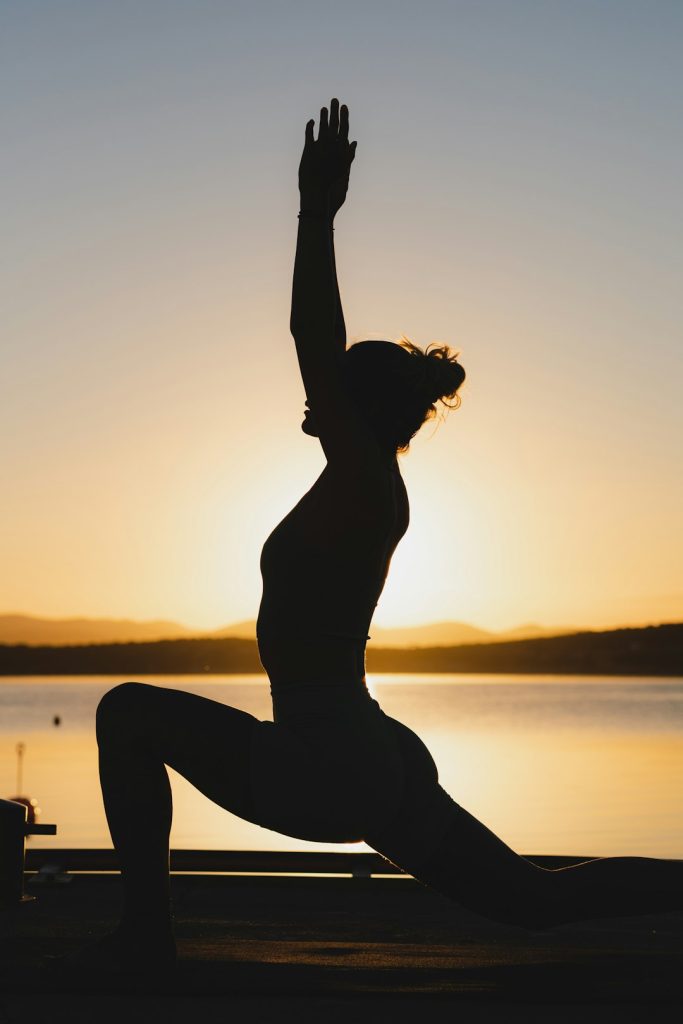 Mastering the First Impression: Your intriguing post title goes here a-woman-doing-a-yoga-pose-in-front-of-a-body-of-water-nbx2vppn64k